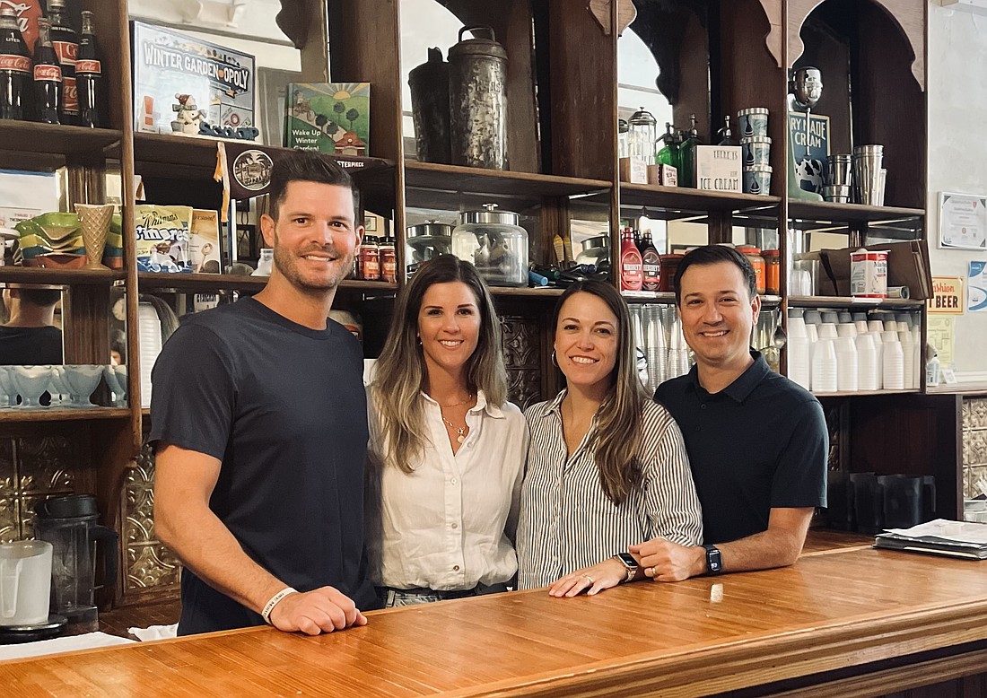 The new owners of Scoops Old Fashioned Ice Cream, Jake and Taylor Brigham and Jessie and Alex Douglas, are thrilled to be able to keep the ice cream shop’s legacy going.