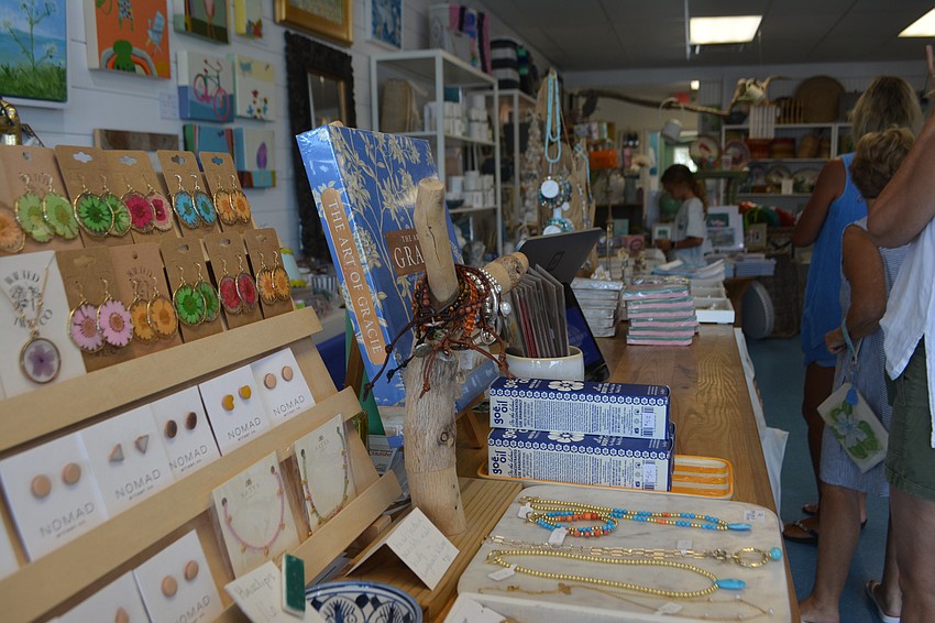 Residents line up to check out all of the unique and amazing items at Driftwood Beach Home and Garden.