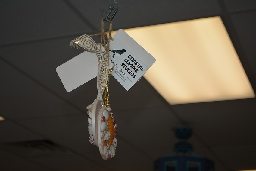 One of the many creations found from Costal Magpie Studios in Driftwood Beach Home and Garden.