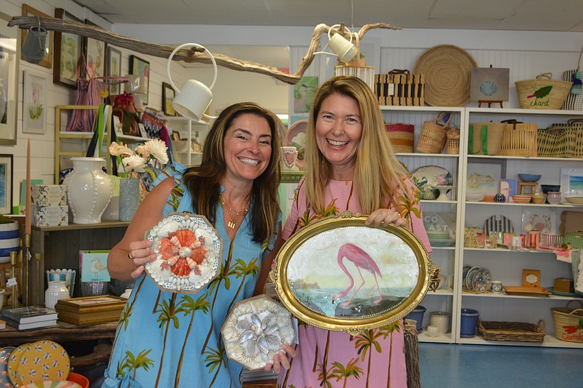 Heather Rippy owner of Driftwood Beach Home and Garden and Michelle Romine artist and owner of Costal Magpie Studios are all smiles.