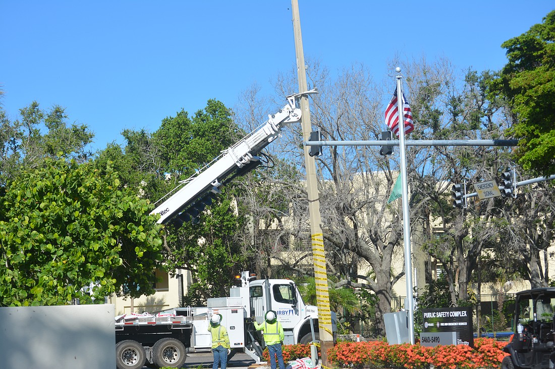 The removal of one of the last poles on Longboat Key by Irby Construction.