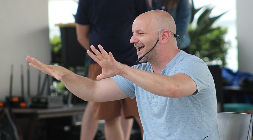 Lakewood Ranch's Kevin Allen connects with the crowd during the Florida Studio Theatre's improv show at Waterside Place June 20.