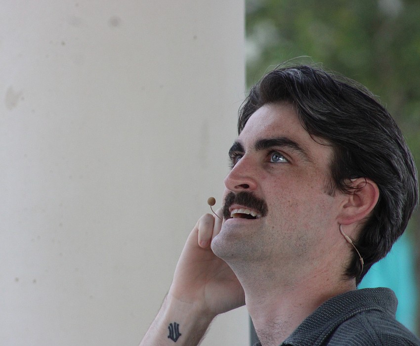 Sarasota's Dellan Short bursts into a song during a skit in the Florida Studio Theatre's show at Waterside Place June 20.