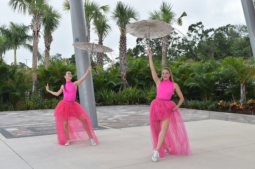 Makayla Lane and Jessica Obiedzinski of Sarasota Contemporary Dance welcome guests to the event.