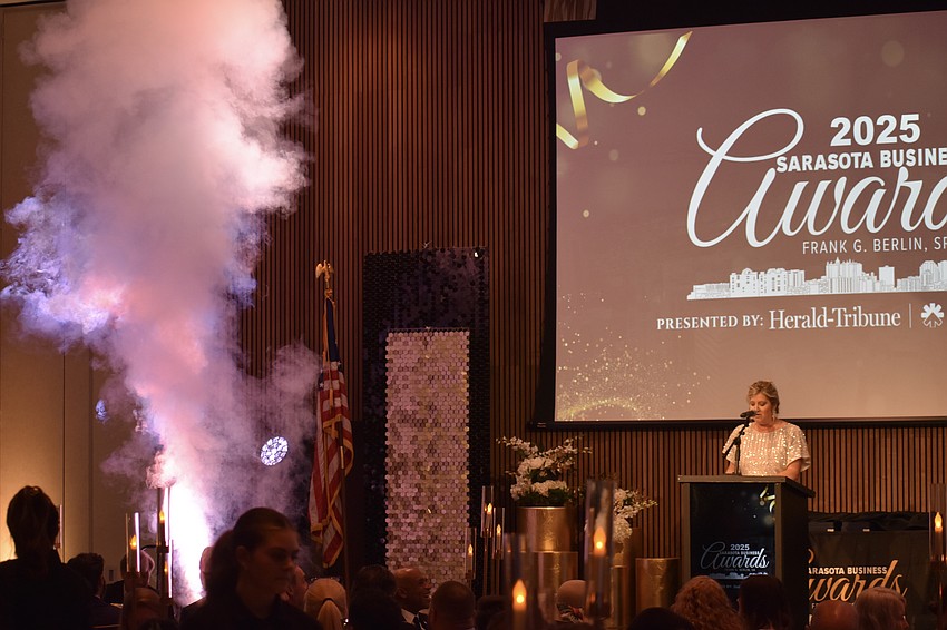 A plume of dry ice rises as the ceremony begins.