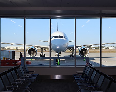 The view through a window wall in Concourse A at Sarasota-Bradenton International Airport.