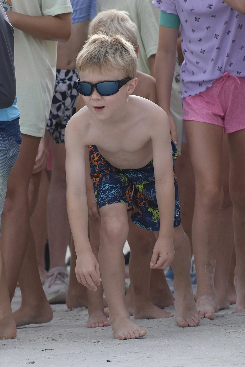 Logan Szuts, 7, prepares to start the run.
