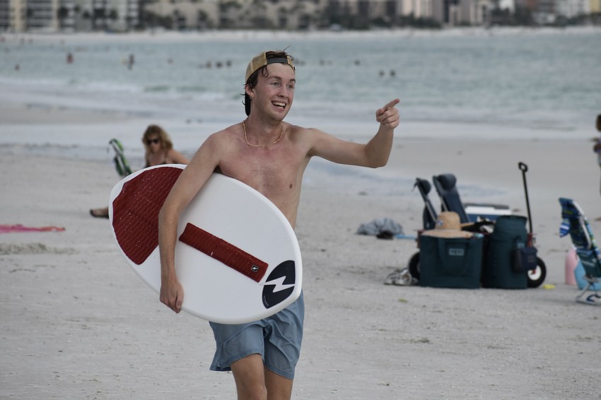 Austin Biller, 18, a former runner with Sarasota High School, incorporated some wakeboarding into his run.