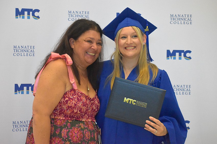 Early Childhood Education Instructor AnnaMaria Mascherino-Carleton poses with graduate Erika Taylor.