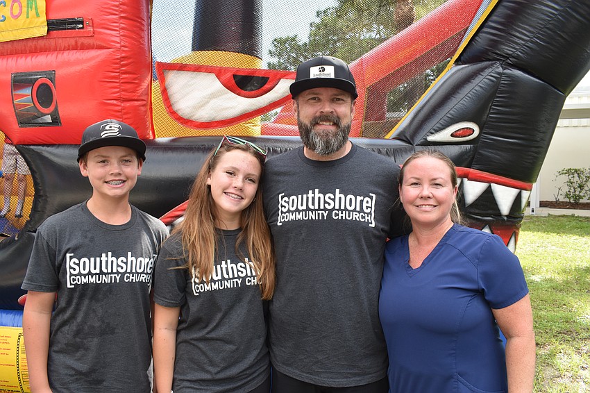 Noah Williams, 13, Aubrie Williams, 14, their father Nic Williams, who is pastor of Southshore Community Church, and their mother Lory Williams