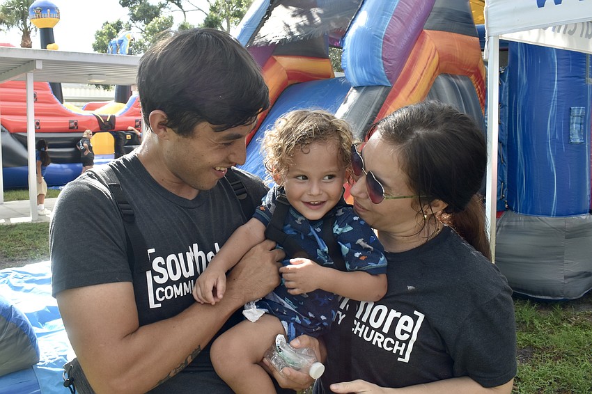 Jonah Patterson, 2 (center) attended with his parents Jordan Sullivan and Brookes Patterson