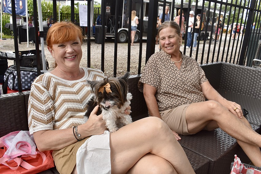 East County's Gina Buckley and Ildi Hall are neighbors who decided to attend the Red, White and Blueberry Celebration together.