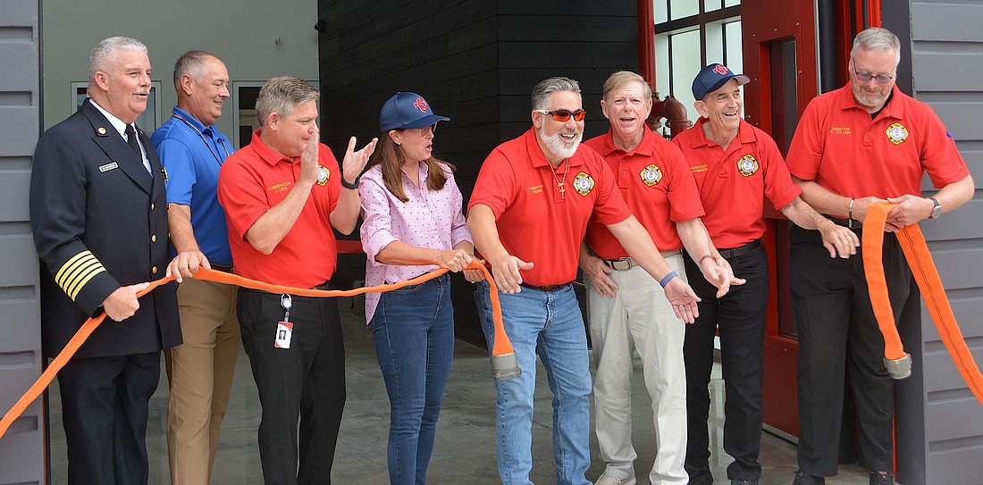 The decoupling of the fire hose to celebrate the new administration building.