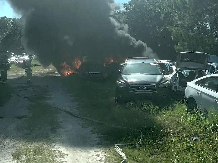 The Palm Coast Fire Department responded to a fire involving about 16 vehicles at a salvage yard off County Road 207 in south Flagler County on June 25. Photo courtesy of PCFD