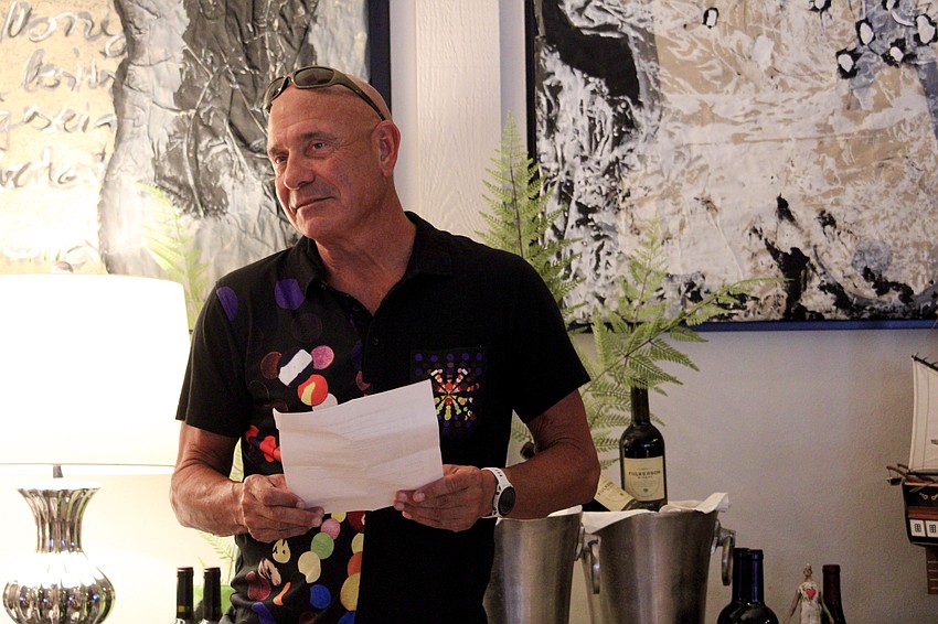 Jeff Driver shares warm remarks about working with outgoing Rotary Club of Longboat Key President Jan Wallace before welcoming Terri Driver.