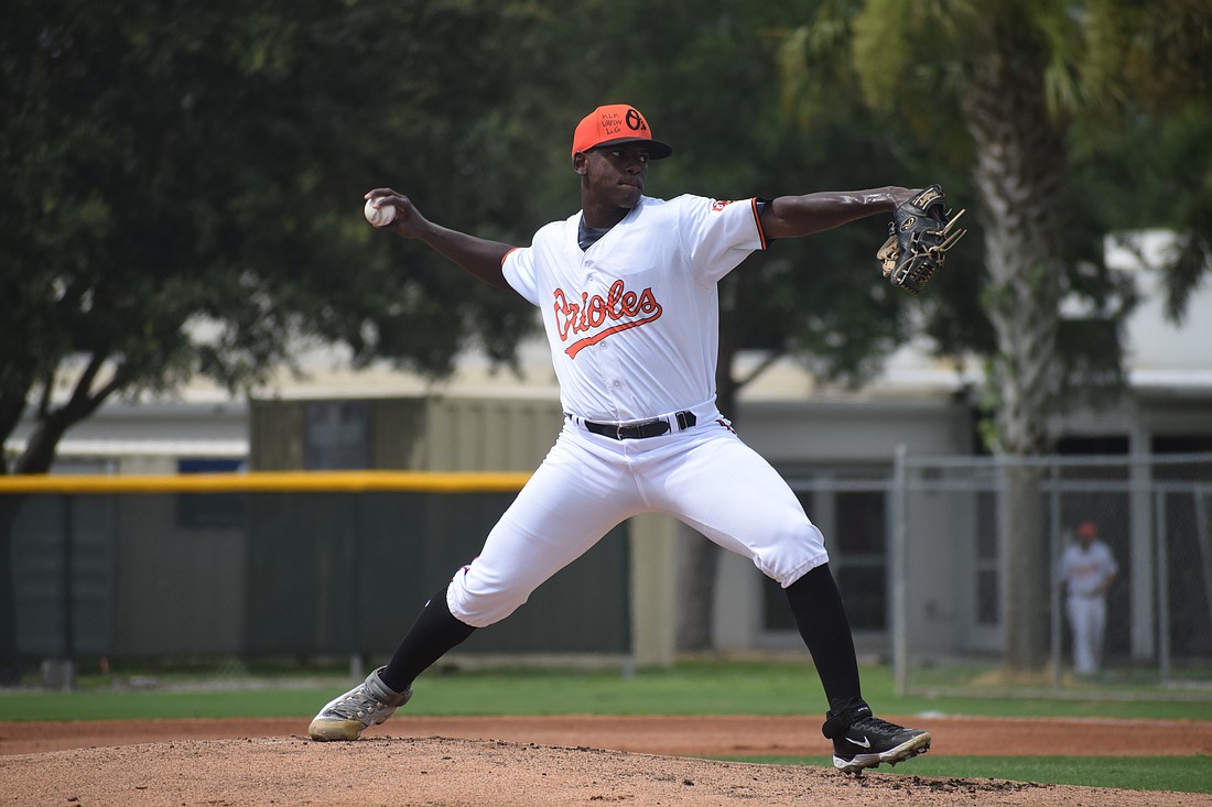 FCL Orioles pitcher Adrian Heredia delivers a pitch against the FCL Rays in a game at Twin Lakes Park on June 30.