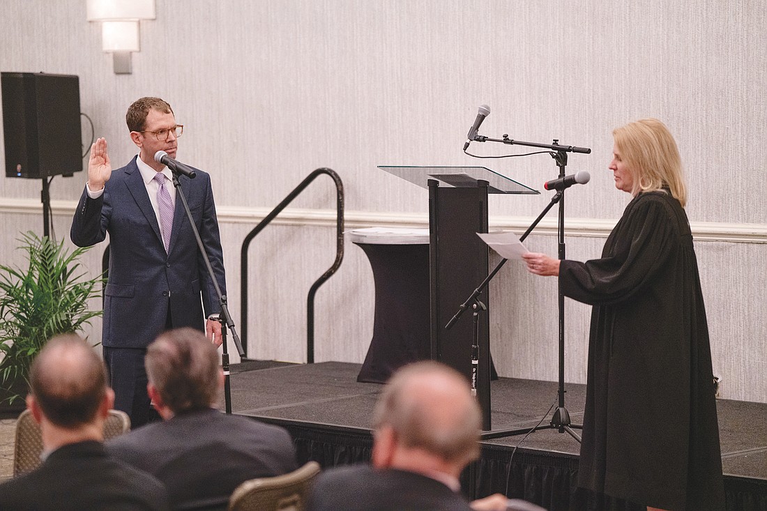 Brian Coughlin, a director at The Bedell Law Firm, was sworn in as the Jacksonville Bar Association’s 2025-26 president June 5 by Circuit Judge Ashley Wells Cox.