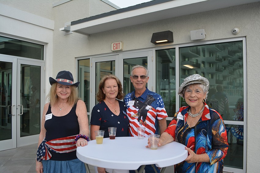 Christine, Green, Della Sweeney, Joseph Sweeney and Mary Andersen all dressed in their red, white and blue.