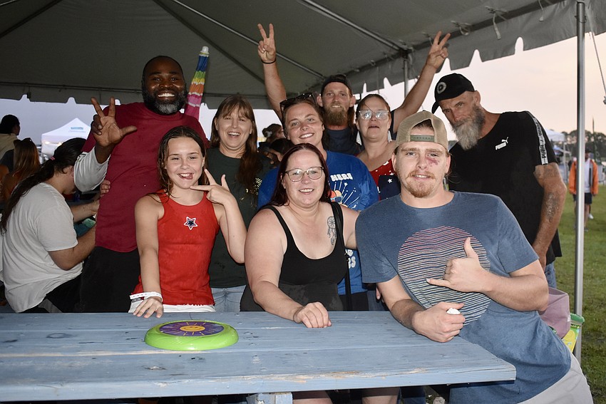 The Williams family, from Port Charlotte, gathers in the Kids Zone presented by Mote Marine Laboratory & Aquarium.