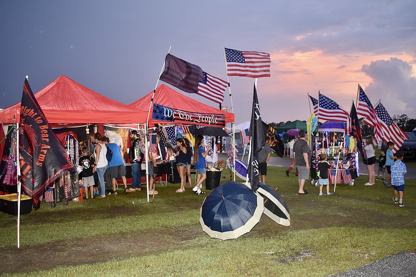The American spirit is strong at Nathan Benderson Park July 3 despite the rain during Fireworks on the Lake.
