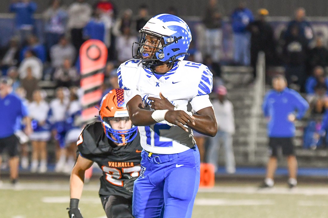 Apopka High quarterback Tyson Davison (No. 12) launched a pass in a road game against West Orange High.