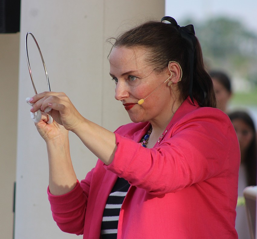 Star Newman introduced the crowd to her brand of magic and mentalism in a show during Star-Spangled Spectacular at Waterside Place July 4.