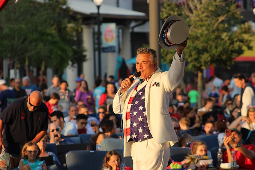 Master of Ceremonies Jared Walker opens the Circus Arts Conservatory show at Star-Spangled Spectacular July 4 at Waterside Place.