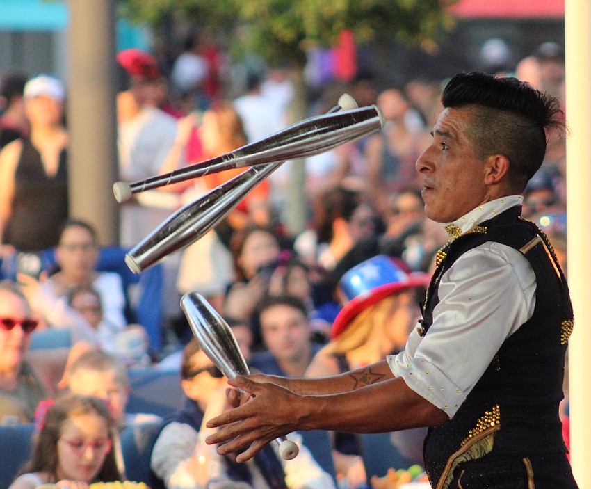 Speed juggler Nilson Escoba of the Circus Arts Conservatory performs at Star-Spangled Spectacular July 4 at Waterside Place.