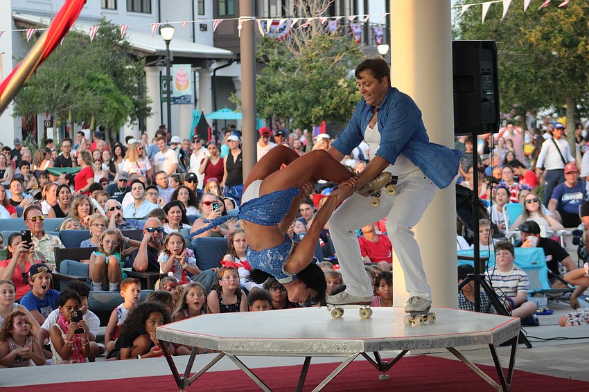 Roller skating dynamos Anita and Karoly Zeman obviously have the utmost trust in each other as they perform at Waterside Place July 4.