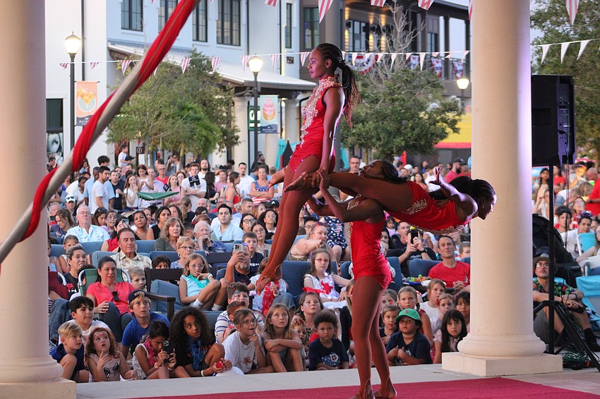 The Trio Black Diamond hand balancing act keeps the crowd on the edge of its seat during Star-Spangled Spectacular.