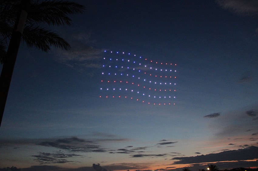 Drones create a flag over Waterside Place during Star-Spangled Spectacular.