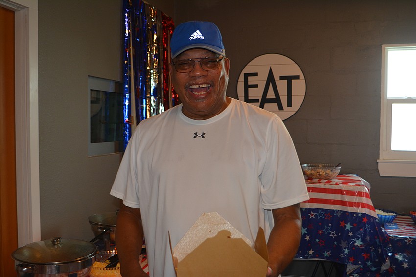 Harris Bailey is ready for all the fun toppings from Hamlet's Eatery.