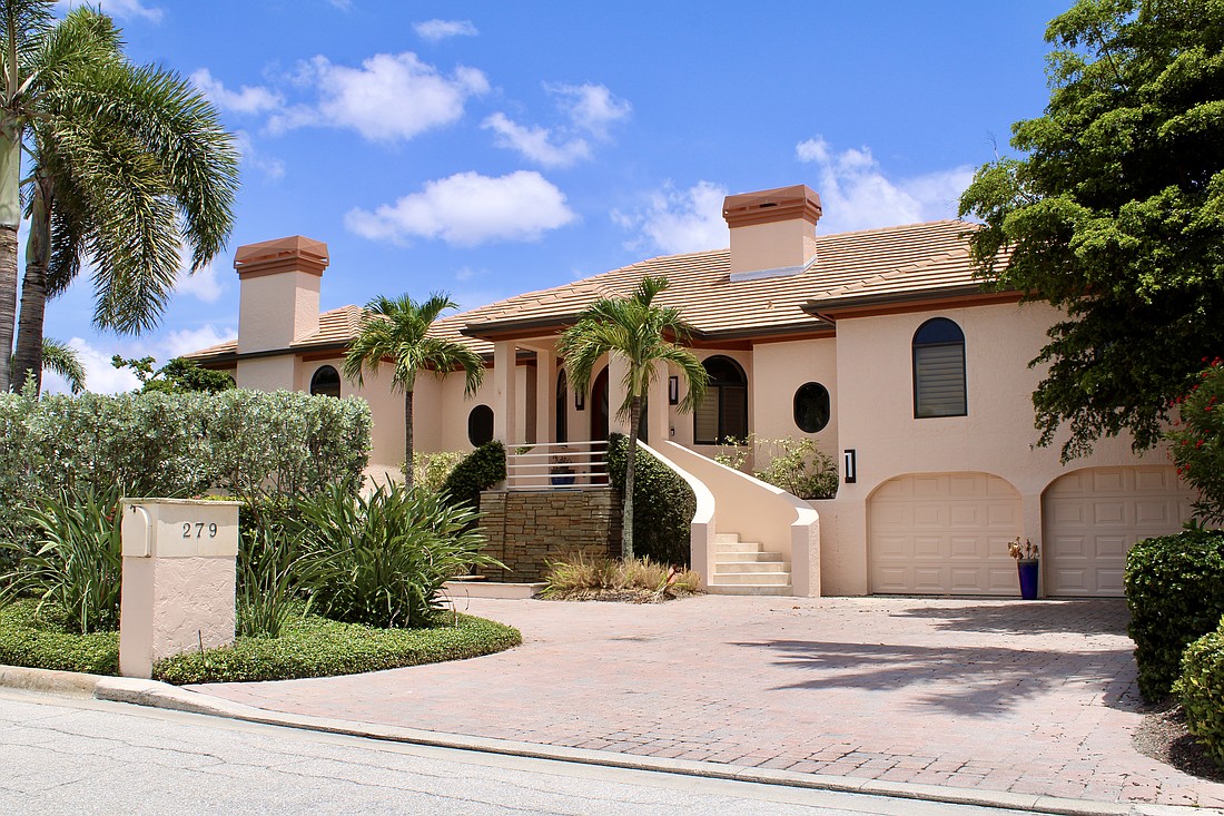 The Bird Key home has three bedrooms, three-and-a-half baths, a pool and 3,933 square feet of living area.