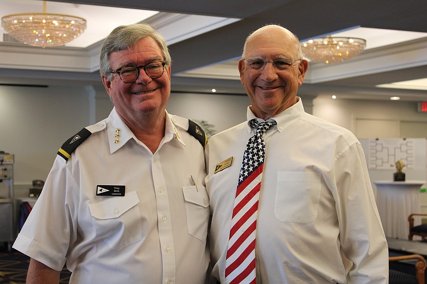 Bird Key Yacht Club Commodore Tony Britt and former Commodore Michael Landis celebrate the Fourth of July at the club.