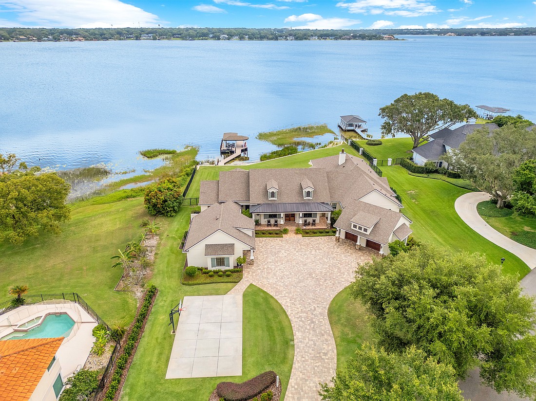 The home at 10845 Bayshore Drive, Windermere, sold July 2, for $3,975,000. This home is sited on more than 150 feet on Lake Down. The sellers were represented by Darrell Nunnelley, Vintage Really Group LLC.