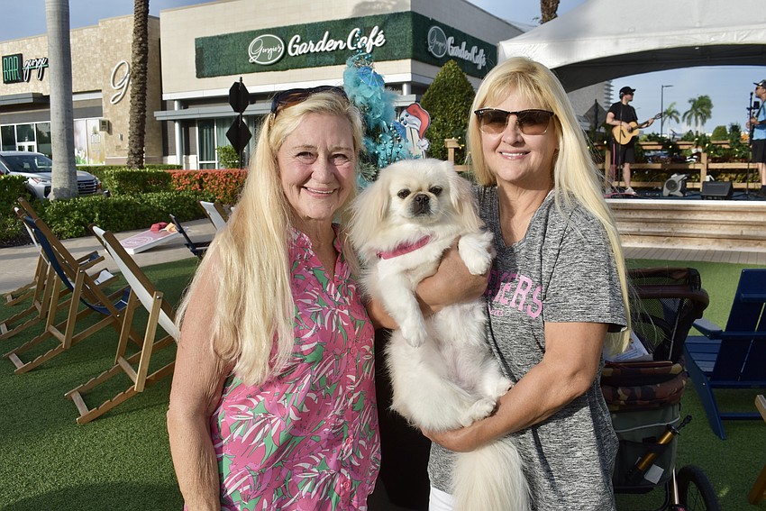 Bradenton's Susan Staton, Lucy the Pekingese and Carla Smith attend Barks and Brews at UTC July 8.