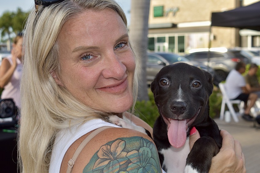 Lakewood Ranch's Megan Hampton is not considering adoption because she has enough dogs at home, but she is considering volunteering for Nate's Honor Animal Rescue Center.