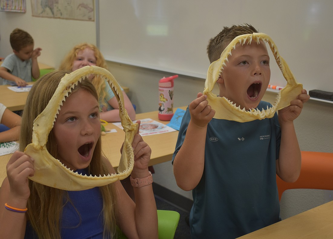Lakewood ranch resident Mackenzie Shin, 10 and Sarasota resident Tyler Hover, 8, explore their love for marine biology at a camp presented by Little Medical School-Suncoast.
