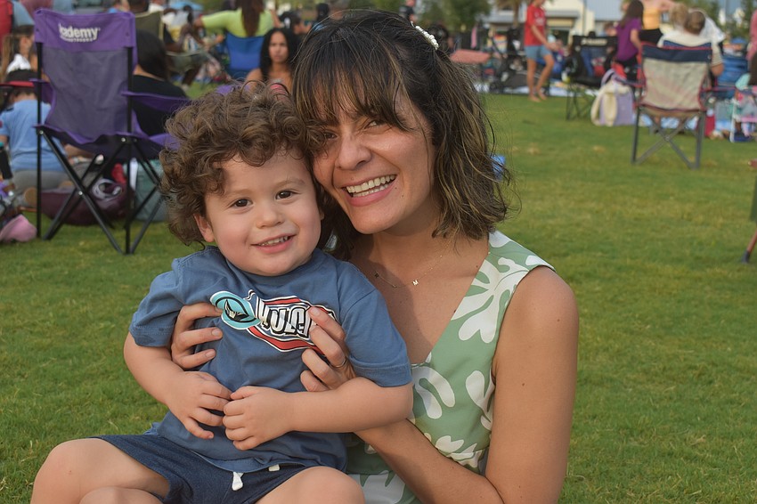 Sarasota's Mateo Ycaza-Landin and his mom Vanessa Landin enjoy their family time at Movie in the Park.