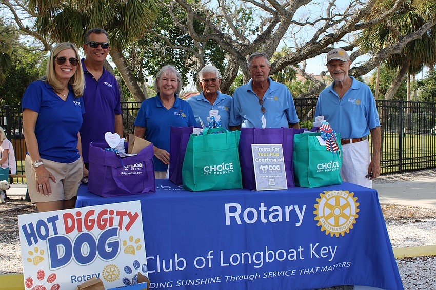 Linda and Rob Emery from Dog Perfect present the awards for the virtual version of the Rotary Club of Longboat Key's 