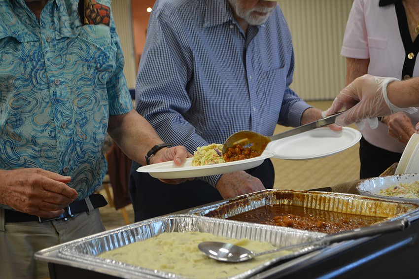 Mission BBQ catering included pulled chicken, baked beans, mashed potatoes and cornbread.