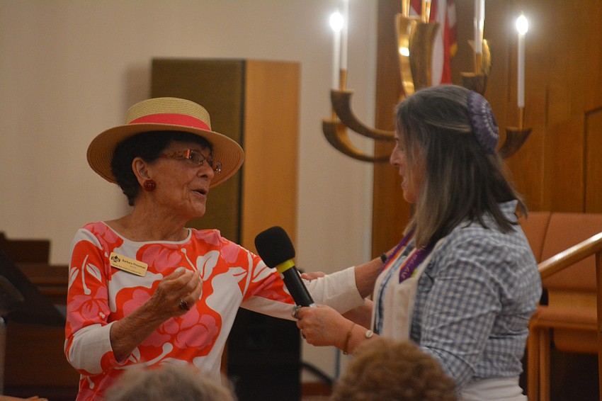Rabbi Jessica Spitalnic Mates wishes a happy birthday to board member Barabara Pressman.