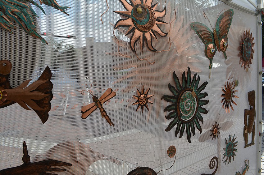 Find decorative art in copper at the Fernando Canales tent at the Downtown Sarasota Farmers Market.