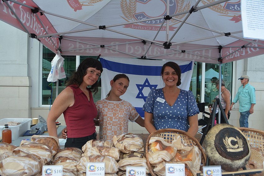 Morgan Mahan, Aviana Caragiulo and Davida Lentini are all smiles at the Camelot Breads booth.