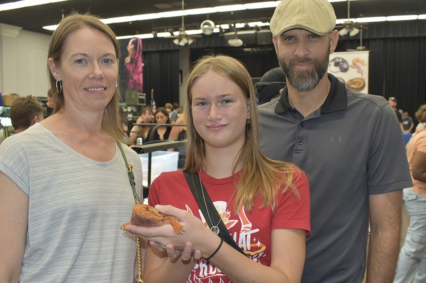 Bethany Van Waardhuizen, her daughter Aria Van Waardhuizen, 12, her husband Jon Waardhuizen, attended with Mushu, a bearded dragon.