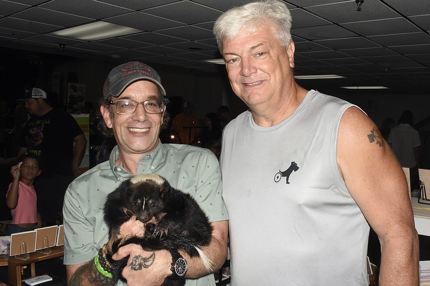 Alex Culver of Pibbles and Company Exotic Animal Advocacy, Felix, and John Cox of RUCK9