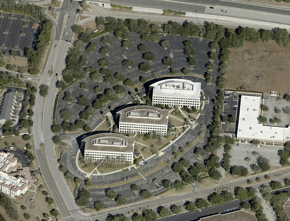 TPG Real Estate Partners Investments LLC wants to divide its property at 4899 Belfort Road in Jacksonville into three parcels. Each office building would be on a separate parcel.