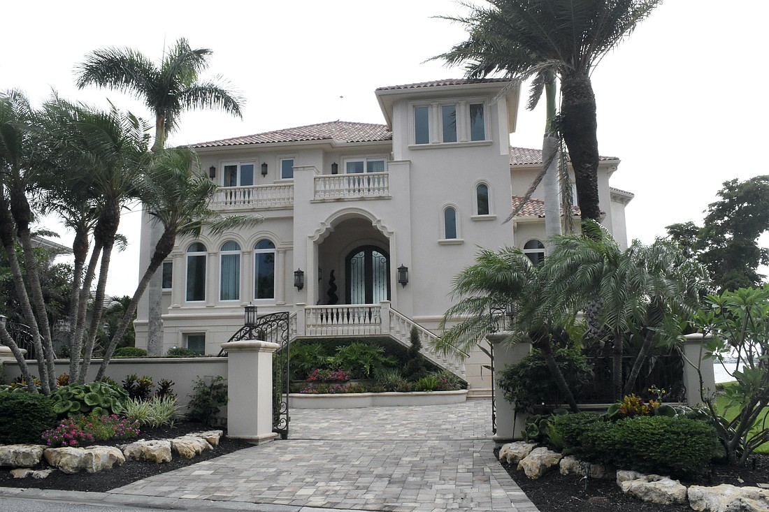 The home at 1378 Harbor Drive was built in 2003 and has four bedrooms, five-and-three-half baths, a pool and 6,235 square feet of living area.