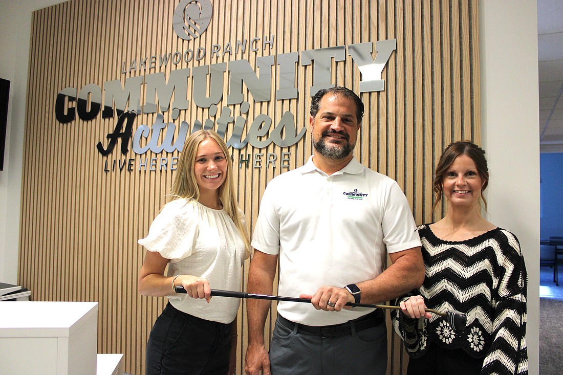 Lakewood Ranch Community Activities' Paige Venuto, Keith Pandeloglou, and Danielle Bugel look forward to the first Communi-tee Golf Classic at Calusa Golf and Country Club Sept. 17.