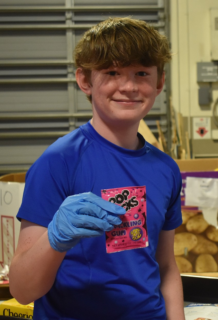 Lakewood Ranch resident Andrew Jones, 13, says he wants to end hunger. His mother Erin Jones told him there are three things you can give to the community: time, talent and treasure.